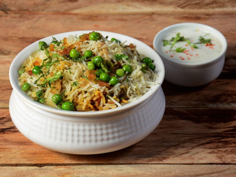 Hyderabadi vegetable dum biryani with fluffy basmati rice and mixed vegetables